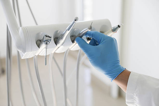 Professional Emergency Dentist technician working in Pinckney, MI